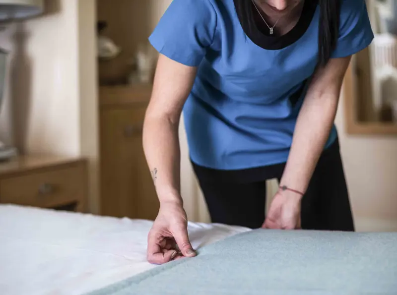 Brudenell Hotel, Housekeeper making bed